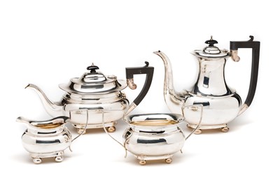 Lot 343 - A GEORGE V SILVER FOUR-PIECE SILVER TEA AND...