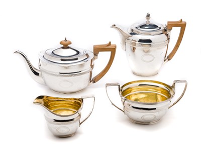 Lot 375 - A GEORGE III SILVER FOUR-PIECE TEA SET^ JOHN...