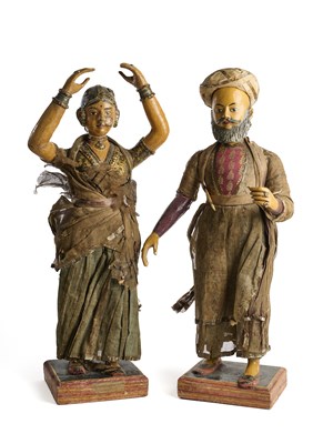 Lot 204 - A PAIR OF LARGE SOUTH INDIAN CARVED AND PAINTED WOOD FIGURES, POSSIBLY PONDICHERRY, CIRCA 1880