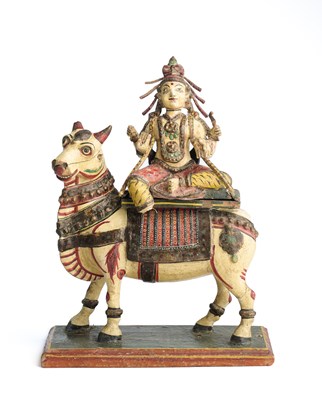 Lot 201 - A POLYCHROME PAINTED WOOD FIGURE OF SIVA ON NANDI, PROBABLY KONDAPALLI, DECCAN, INDIA, CIRCA 1880