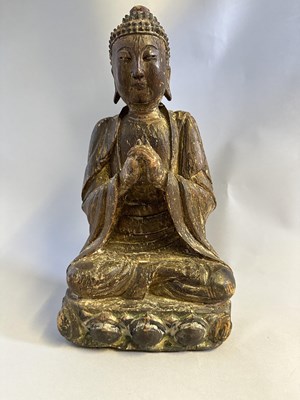 Lot 92 - A CHINESE SEATED LACQUERED WOOD BUDDHA, MING DYNASTY, 17TH CENTURY