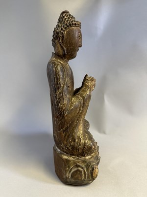 Lot 92 - A CHINESE SEATED LACQUERED WOOD BUDDHA, MING DYNASTY, 17TH CENTURY