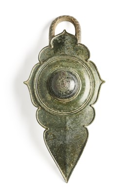 Lot 126 - A KHMER BRONZE BUCKLE , CAMBODIA, 12TH/13TH CENTURY