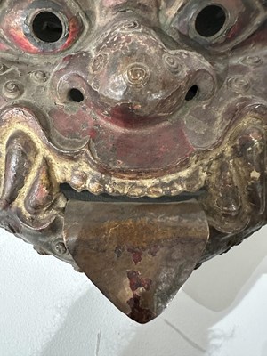 Lot 131 - A PAINTED AND COPPER REPOUSSE KIRTIMUKHA MASK, TIBET, 18TH/19TH CENTURY