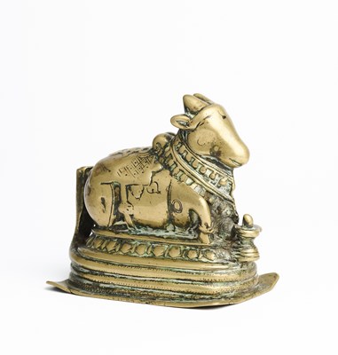 Lot 176 - A BRONZE FIGURE OF NANDI, DECCAN, SOUTHERN INDIA, CIRCA 18TH CENTURY