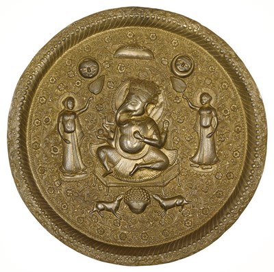 Lot 188 - A REPOUSSE BRASS TRAY DEPICTING GANESHA, NORTHERN INDIA, LATE 19TH CENTURY