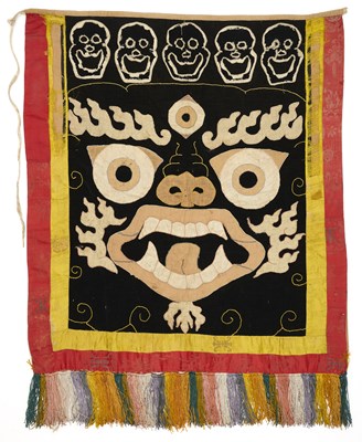 Lot 142 - A SILK AND COTTON APPLIQUE RITUAL APRON, TIBET, CIRCA 1900