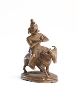 Lot 180 - A SMALL BRONZE FIGURE OF SIVA ON NANDI, ORISSA, EASTERN INDIA, 17TH/18TH CENTURY