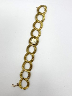 Lot 314 - PIAGET, REF.3115: A LADY'S GOLD BRACELET WATCH, SWISS, 1960s