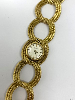 Lot 314 - PIAGET, REF.3115: A LADY'S GOLD BRACELET WATCH, SWISS, 1960s