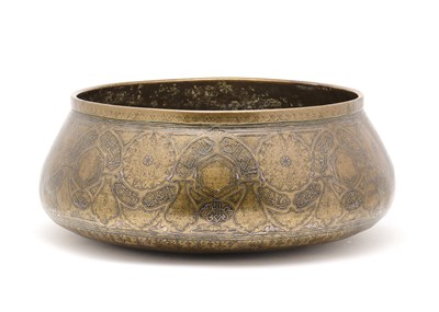 Lot 94 - AN ENGRAVED AND SILVER INLAID BRASS BOWL, PROBABLY EGYPT, 18TH/19TH CENTURY