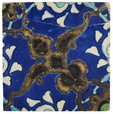 Lot 85 - A CUERDA SECA AND UNDERGLAZE PAINTED TILE, OTTOMAN LEVANT, SECOND HALF 16TH CENTURY