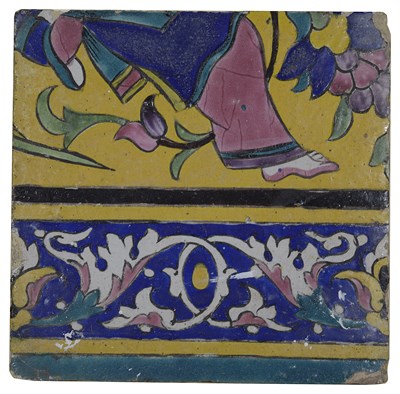 Lot 516 - A QAJAR POLYCHROME-GLAZED CUERDA SECA TILE