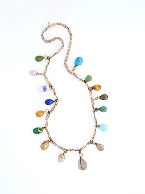 Lot 319 - RUSSIAN GOLD, SILVER, HARDSTONE AND GEM-SET EASTER EGG PENDANT NECKLACE, 1900s