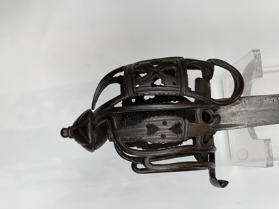 Lot 250 - A SCOTTISH BASKET HILTED BROADSWORD, SECOND QUARTER OF THE 18TH CENTURY