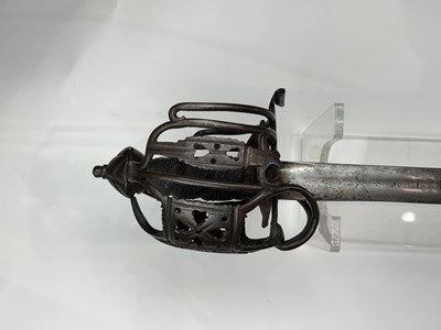 Lot 250 - A SCOTTISH BASKET HILTED BROADSWORD, SECOND QUARTER OF THE 18TH CENTURY