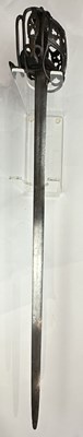 Lot 250 - A SCOTTISH BASKET HILTED BROADSWORD, SECOND QUARTER OF THE 18TH CENTURY