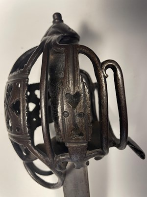 Lot 250 - A SCOTTISH BASKET HILTED BROADSWORD, SECOND QUARTER OF THE 18TH CENTURY