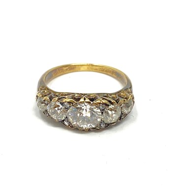 Lot 360 - DIAMOND HALF-HOOP GOLD RING, 1890s