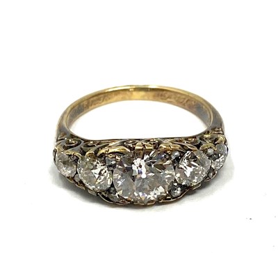 Lot 360 - DIAMOND HALF-HOOP GOLD RING, 1890s