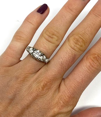 Lot 360 - DIAMOND HALF-HOOP GOLD RING, 1890s