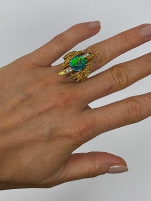 Lot 388 - GRIMA: GOLD, OPAL AND DIAMOND RING, 1971