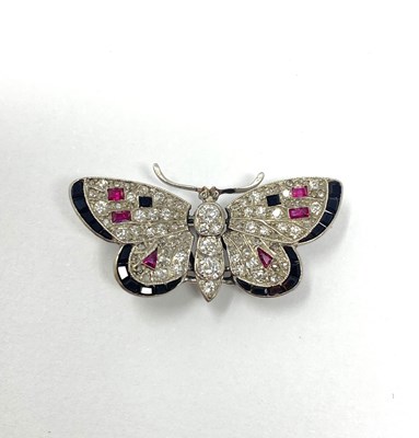 Lot 363 - DIAMOND, ONYX AND RUBY BROOCH, 1920s