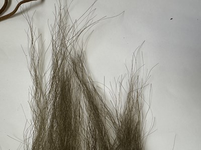 Lot 39 - TWO CHINESE CINNABAR LACQUER FLY WHISKS, QING DYNASTY, 19TH CENTURY