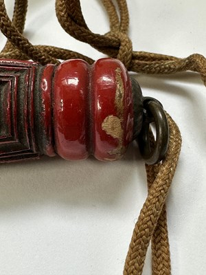 Lot 39 - TWO CHINESE CINNABAR LACQUER FLY WHISKS, QING DYNASTY, 19TH CENTURY
