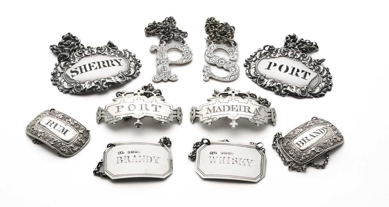 Lot 253 - FIVE PAIRS OF GEORGIAN AND VICTORIAN SILVER WINE LABELS