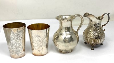 Lot 138 - TWO VICTORIAN SILVER MILK JUGS AND TWO BEAKERS