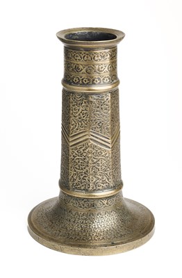 Lot 98 - A SAFAVID BRASS TORCH STAND, IRAN, 17TH CENTURY