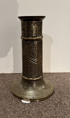 Lot 98 - A SAFAVID BRASS TORCH STAND, IRAN, 17TH CENTURY