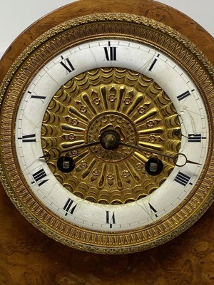 Lot 582 - A RESTAURATION ORMOLU-MOUNTED BURR WOOD MANTEL CLOCK, PARIS, CIRCA 1840
