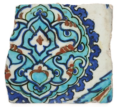 Lot 89 - AN IZNIK TILE FRAGMENT, OTTOMAN ANATOLIA, CIRCA 1570-80