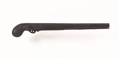 Lot 132 - A RARE EBONY PIPE CASE FORMED AS A FLINTLOCK PISTOL