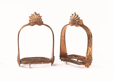 Lot 134 - A PAIR OF ENGLISH GILT-BRASS STIRRUPS