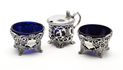 Lot 170 - A PAIR OF VICTORIAN PIERCED SILVER SALT CELLARS AND A MUSTARD POT, ALL LONDON, 1840 / 44