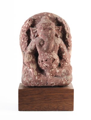 Lot 154 - A MOTTLED PINK SANDSTONE RELIEF DEPICTING GANESHA, NORTHERN INDIA, CIRCA 8TH CENTURY