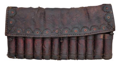 Lot 498 - A LEATHER BANDOLIER, 19TH CENTURY