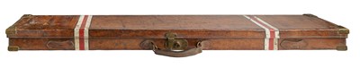 Lot 497 - A LEATHER-CLAD RIFLE CASE