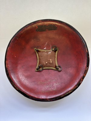 Lot 20 - AN INDIAN HIDE SHIELD (DHAL), 19TH CENTURY, SIGNED BHAGUAN KHOOSALOA, AHMEDABAD