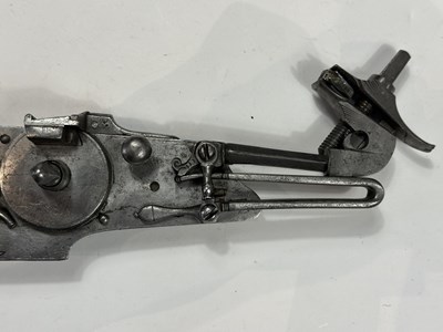 Lot 213 - A RARE DETACHED GERMAN COMBINED MATCH-AND WHEEL-LOCK MECHANISM, LATE 16TH CENTURY