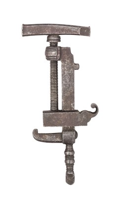 Lot 208 - A COMBINED MAINSPRING CLAMP, TURNSCREW, HAMMER AND KNAPPER, PROBABLY 17TH CENTURY