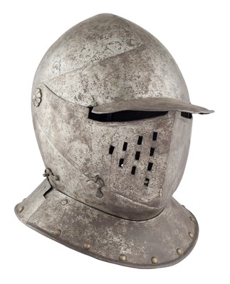 Lot 197 - A NORTH ITALIAN CLOSE HELMET, FIRST QUARTER OF THE 17TH CENTURY