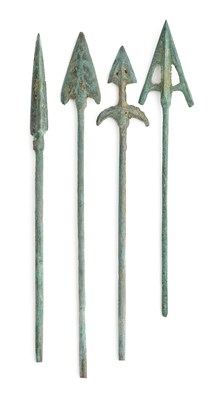 Lot 396 - TWO DISPLAYS OF ARROWHEADS, FOUR COPPER ALLOY ARROWHEADS AND A QUIVER, POSSIBLY TIBETAN