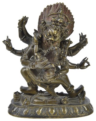 Lot 17 - A SINO-TIBETAN BRONZE FIGURE OF MAHAKALA