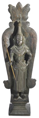 Lot 21 - A SINHALESE BRONZE FIGURE OF A DVARAPALA (?)