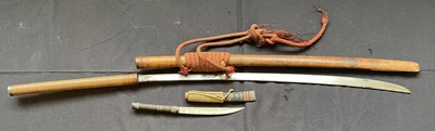 Lot 600 - A BURMESE SWORD (DHA) AND A SMALL DAGGER, LATE 19TH/20TH CENTURY