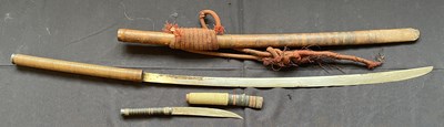 Lot 600 - A BURMESE SWORD (DHA) AND A SMALL DAGGER, LATE 19TH/20TH CENTURY